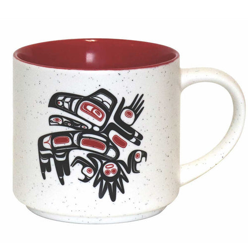 Ceramic mug with Native Northwest artwork of a symbol called running raven.