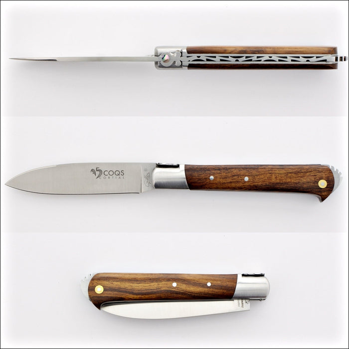 5 Coqs Pocket Knife, top-down view of open blade and desert ironwood handle with mother of pearl inlay. Handcrafted details, 100% Made in France.