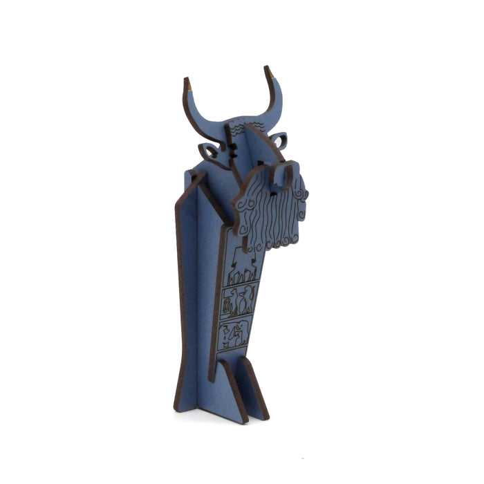 3-d puzzle of an ancient Mesopotamian Artifact which is a decorative Bull-head and plaque. Puzzle is in blue on a white background.