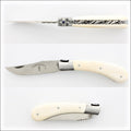 Capuchadou 10 cm Guilloche Folding Knife, side view of open blade and cattle bone handle. Handcrafted details, 100% Made in France.