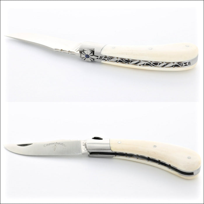 Capuchadou 10 cm Guilloche Folding Knife, close-up of cattle bone handle with intricate design. Handcrafted details, 100% Made in France.