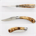 Capuchadou 12 cm Classic Folding Knife - Poplar Burl. Top-down view of the open knife, showing the light brown burl handle and stainless steel blade. Handcrafted details, 100% Made in France.