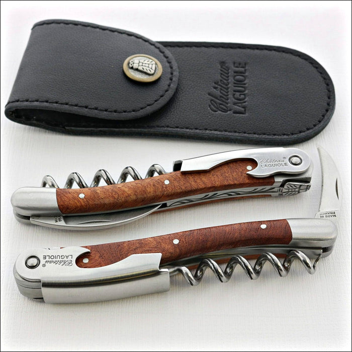 Chateau Laguiole Classic Amboyna Burl Corkscrew, top-down view of two corkscrews and leather pouch. Handcrafted details, 100% Made in France.