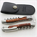 Chateau Laguiole Classic Amboyna Burl Corkscrew, top-down view of two corkscrews and leather pouch. Handcrafted details, 100% Made in France.