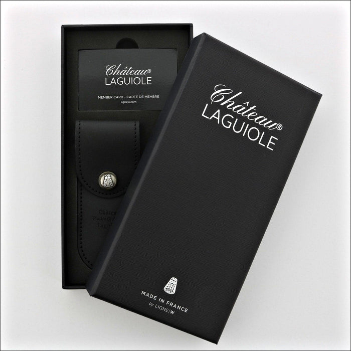 Chateau Laguiole Classic Juniper Corkscrew. Top-down view of the black gift box and leather sheath. Handcrafted details, 100% Made in France.