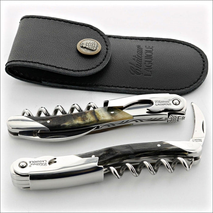 Chateau Laguiole Grand Cru Dark Ram Horn Corkscrew, top-down view of two corkscrews and leather pouch. Handcrafted details, 100% Made in France.