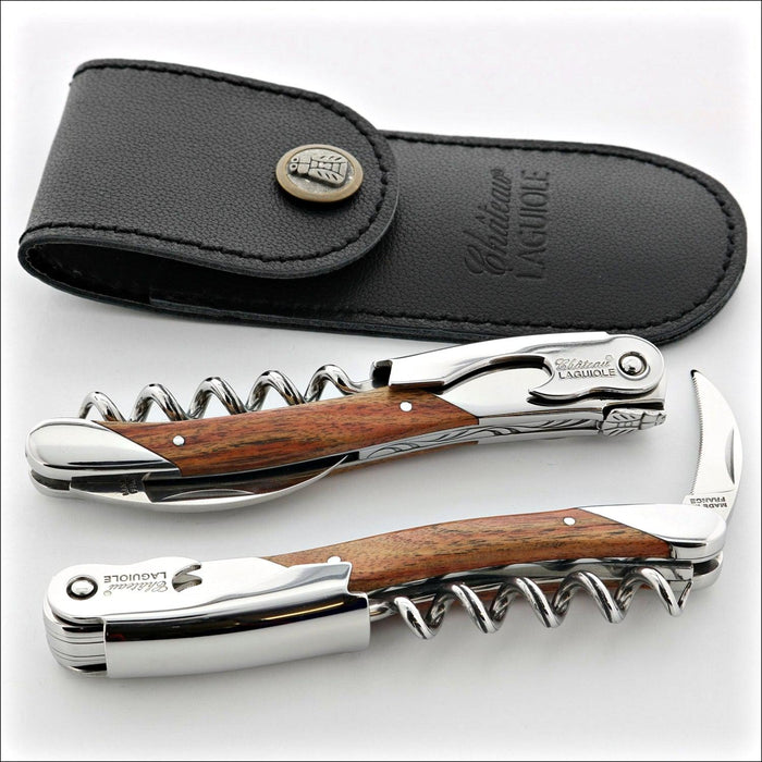 Chateau Laguiole Grand Cru Rosewood Corkscrew, top-down view of two corkscrews and black leather sheath. Handcrafted details, 100% Made in France.
