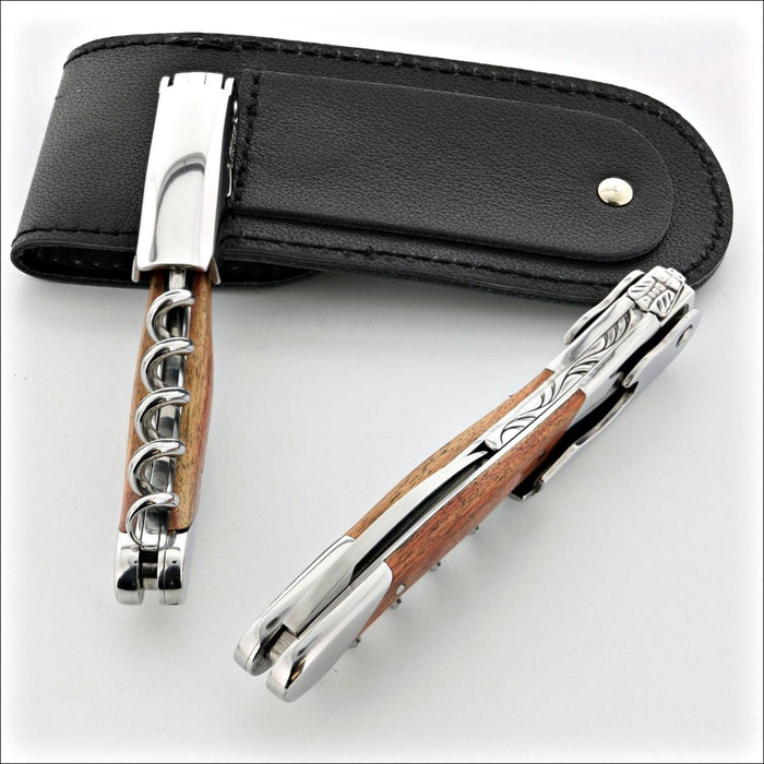 Chateau Laguiole Grand Cru Rosewood Corkscrew, close-up of two corkscrews with a black leather case. Handcrafted details, 100% Made in France.