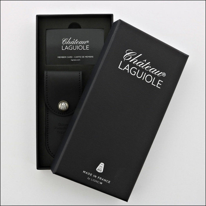 Chateau Laguiole Grand Cru Rosewood Corkscrew: Open black gift box with corkscrew in a leather sheath and member card. Handcrafted details, 100% Made in France.