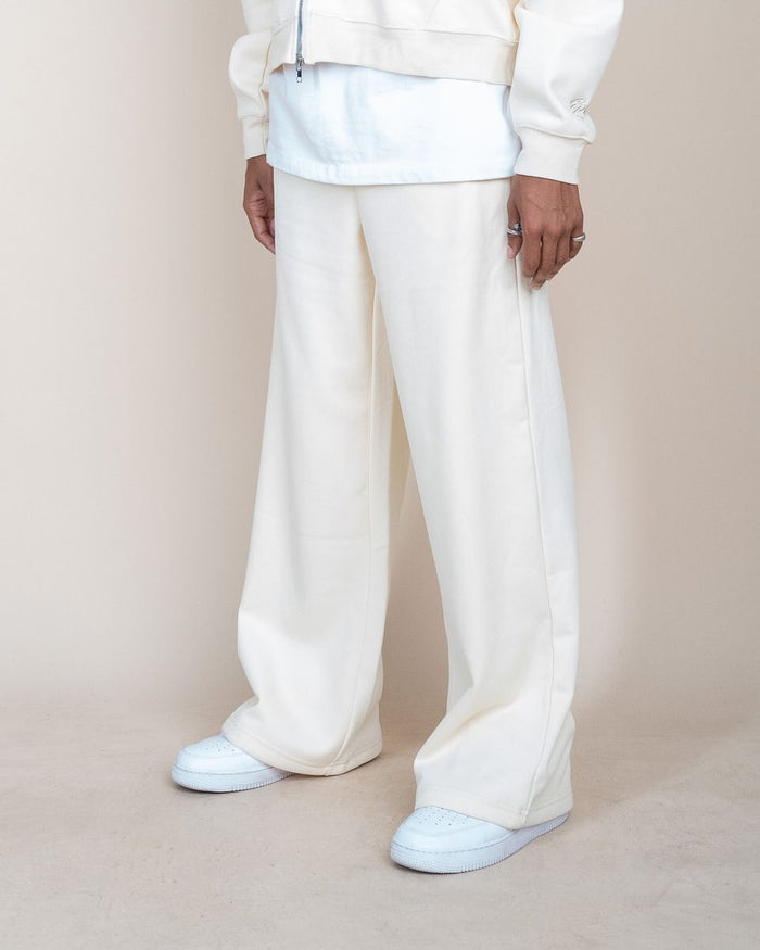 Cream fleece pants with inside drawstring and elastic waistband