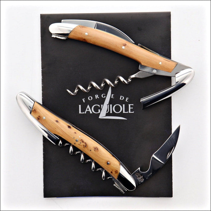 Forge de Laguiole Corkscrew Juniper: top-down view of two shiny steel corkscrews with wood handles.