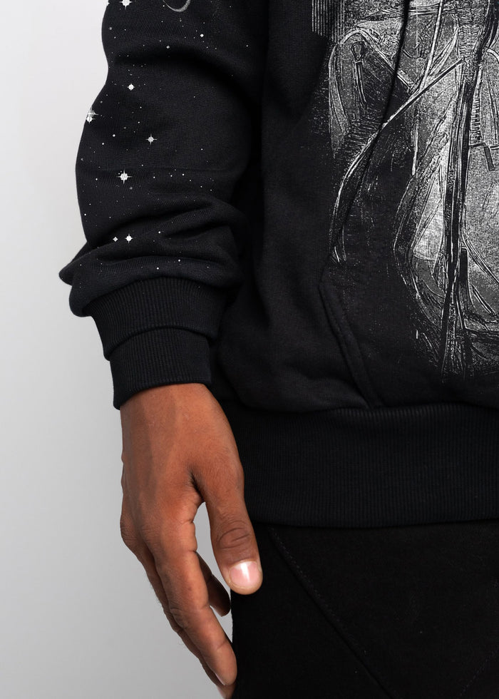 Black hoodie with space-themed design and true-to-size fit for a comfortable wear