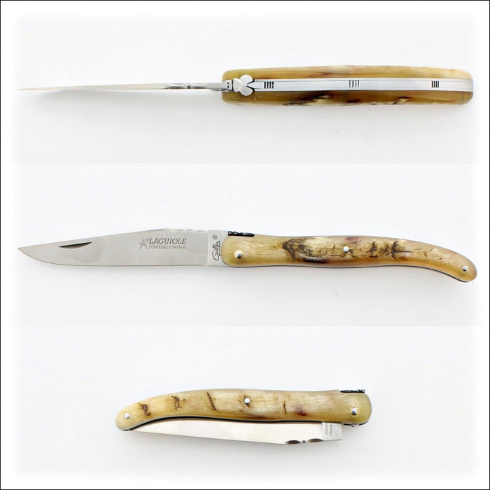 Laguiole Full Handle 12 cm "Old school" Ram Horn Tip. Side view of the folded knife, highlighting the natural ram horn handle. Handcrafted details, 100% Made in France.