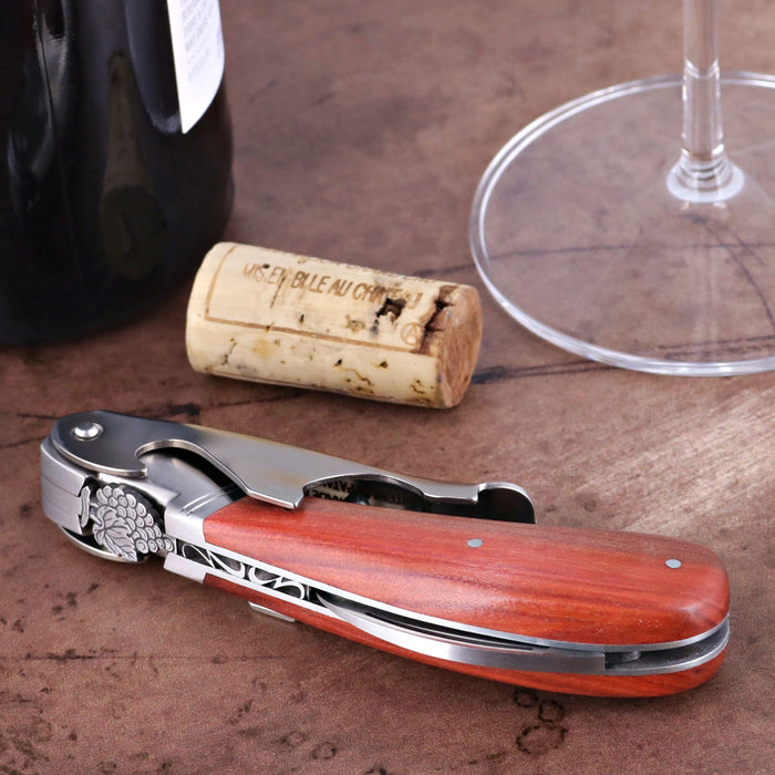 Laguiole Magnum Corkscrew Deco Grape - Rosewood, close-up of rosewood handle and grape-engraved bolster.