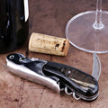 Laguiole Magnum Dark Ram Horn Corkscrew, close-up side view of polished steel and dark horn handle.