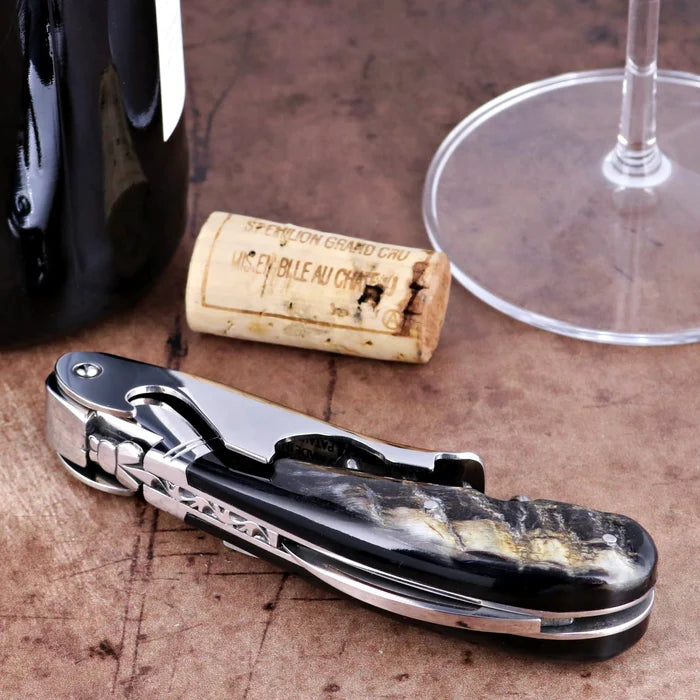 Laguiole Magnum Dark Ram Horn Corkscrew, close-up side view showing polished steel and horn handle.