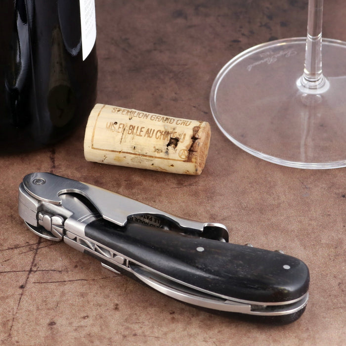 Laguiole Magnum Ebony Corkscrew, high-angle view of the folded black wood handle and steel mechanism.