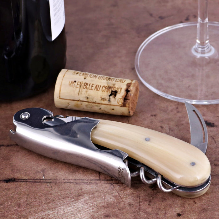 Laguiole Magnum Horn Tip Corkscrew, close-up of cream horn handle, shiny metal, and corkscrew.