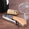 Laguiole Magnum Juniper Corkscrew, close-up of light wood handle and stainless steel tools.