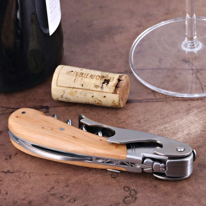 Laguiole Magnum Juniper Corkscrew, close-up of juniper wood handle and stainless steel tools.