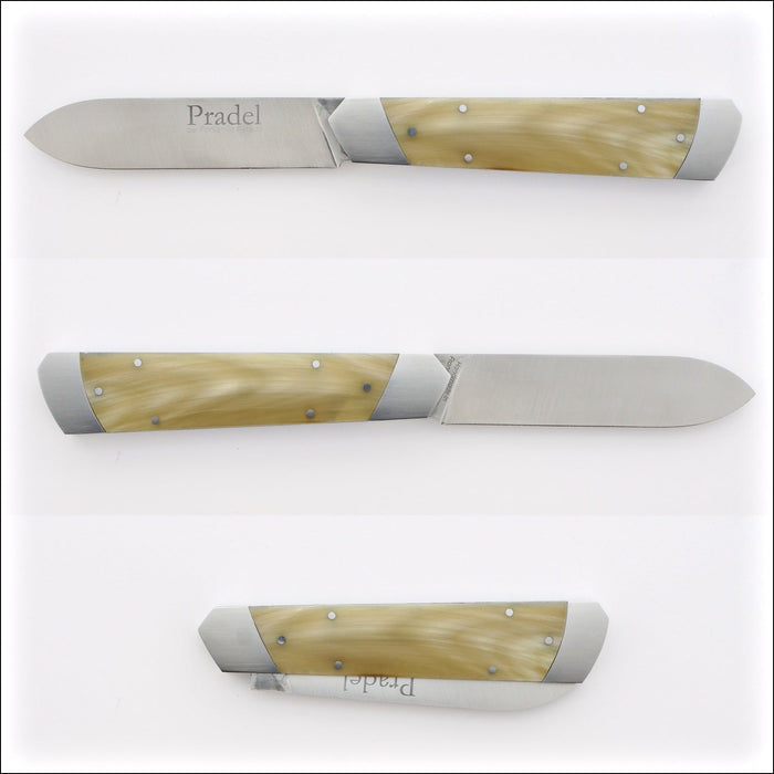 Pradel Folding Knife Light Horn Tip Handle. Close-up of the light horn handle with metal bolsters. Handcrafted details, 100% Made in France.