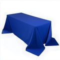 Blue tablecloth draped elegantly over a rectangular table