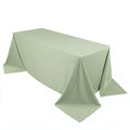 Light green rectangular tablecloth on a plain background
