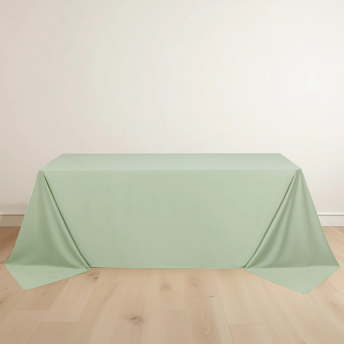 Mint green tablecloth on a wooden floor