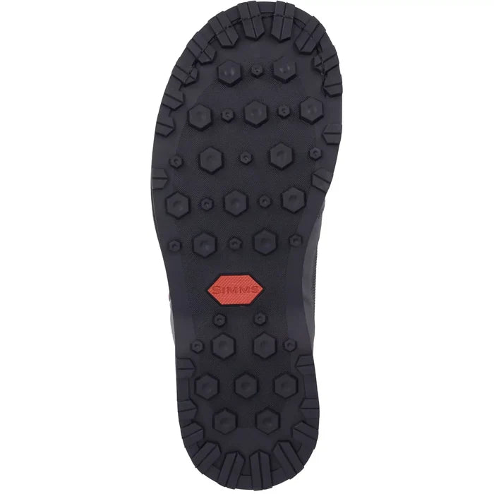 Multi-directional lug rubber outsole of Simms Tributary wading boot with hexagonal traction pods