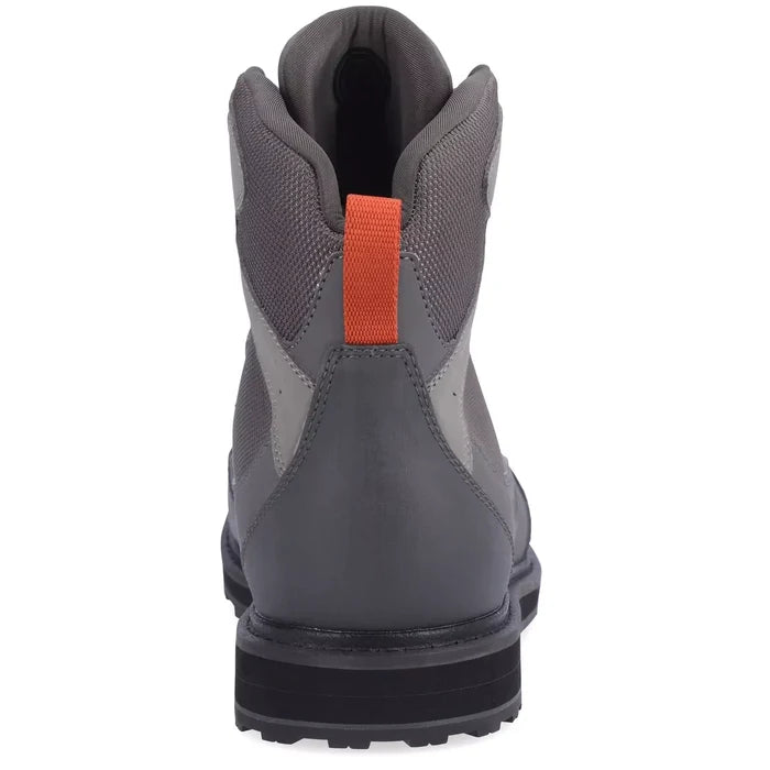 Rear view of Simms Tributary wading boot featuring orange heel pull tab and neoprene lining